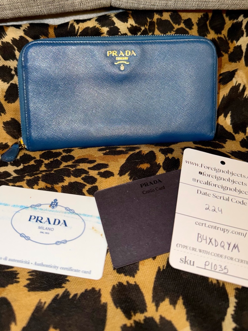 Prada Blue Saffiano Zip-Around Wallet with Gold Logo